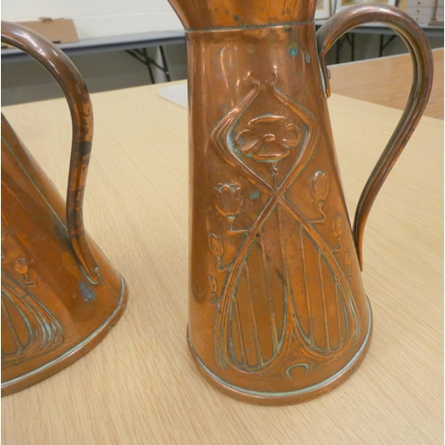 91 - Two early 20th century Joseph Sankey & Sons Art Noveau copper pitchers with tulip pattern to the... 