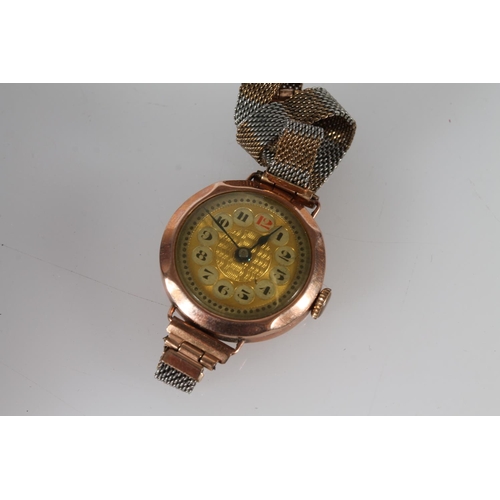 386 - 9ct gold cased wristwatch on plated strap