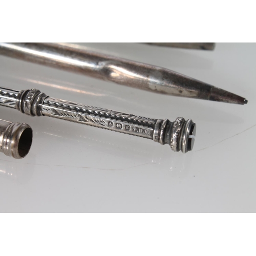 395 - Victorian hallmarked silver propelling pencil, two other silver pencils and a plated propelling mark... 