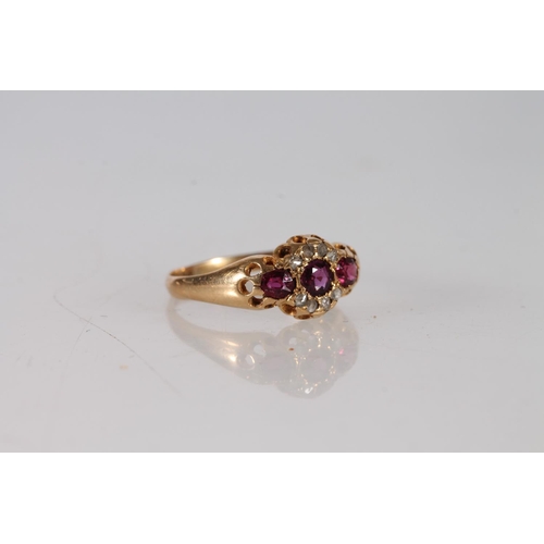 405 - 18ct gold ruby and diamond ring, makers mark 'M&S', size T, 2.8g.