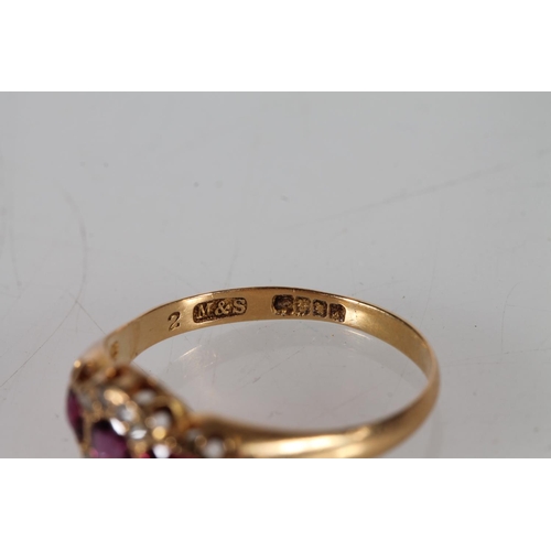 405 - 18ct gold ruby and diamond ring, makers mark 'M&S', size T, 2.8g.