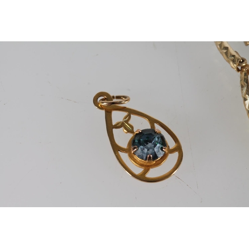 412 - 9ct gold pendant set with central blue stone, 0.8g, a 9ct gold trace chain, 0.4g, and a pair of 9ct ... 