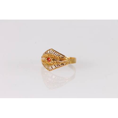 416 - Unmarked gold dress ring set with a small ruby, size N, 1.5g. 