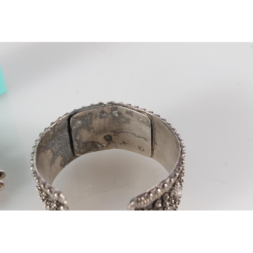 418 - German white metal cuff bangle c1890, and a silver bracelet with ball links in the manner of Links o... 