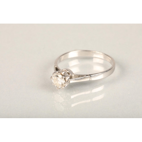 117 - White metal and diamond solitaire ring, the central brilliant cut diamond in eight claw collet setti... 