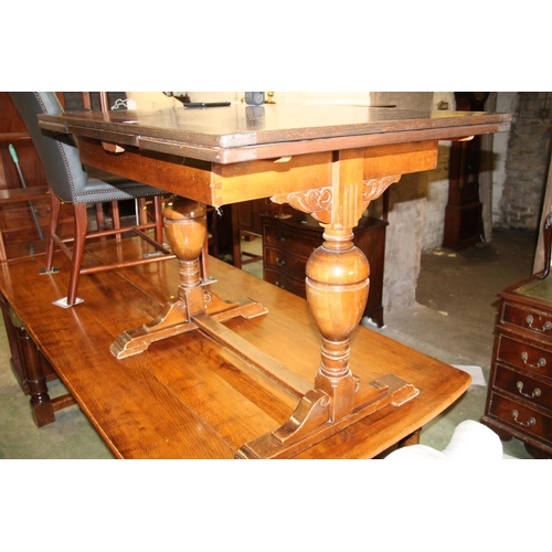 491 - Oak draw leaf dining table, 76cm high.