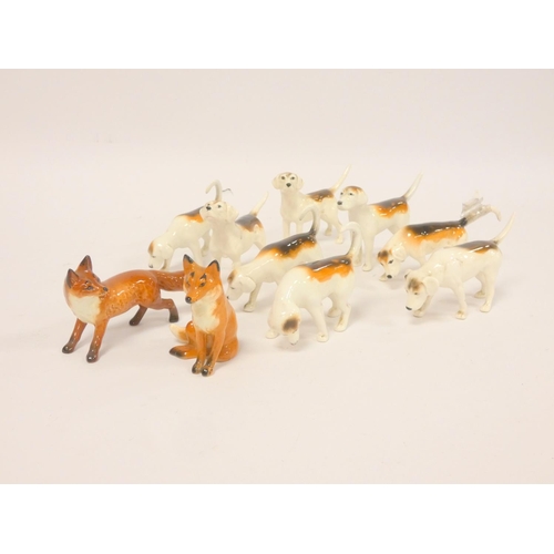 187 - Group of Beswick figures comprising of eight foxhounds and two foxes. (10)