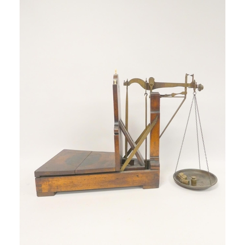 338 - Early 19th century Italian mahogany shop scales by B. Greppi of Milan. Height 50cm.