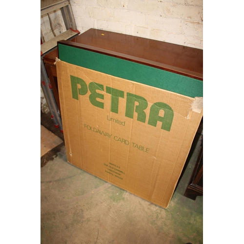 462 - Petra fold away card table boxed.