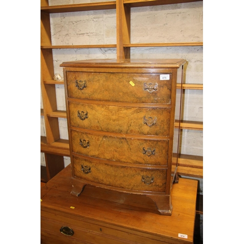 475 - Walnut bow fronted chest of four drawers, 72cm tall.