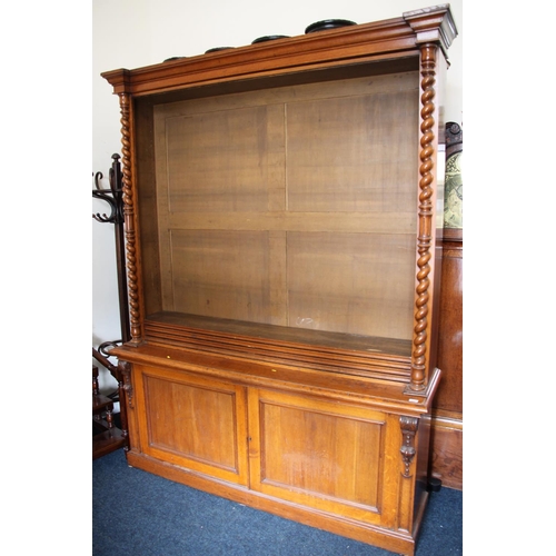 504 - Victorian stained oak library bookcase with barley twist pilasters over a cupboard, H247cm, W188cm.