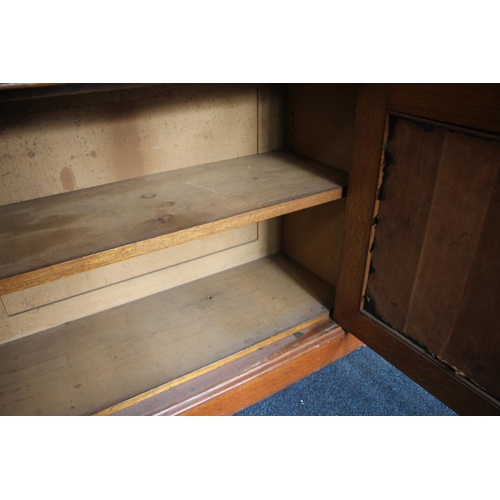 504 - Victorian stained oak library bookcase with barley twist pilasters over a cupboard, H247cm, W188cm.