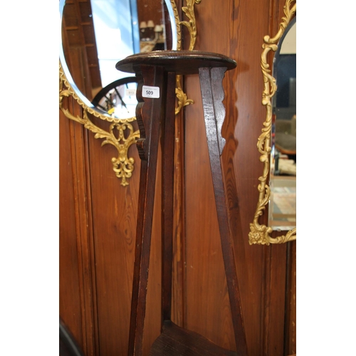 509 - Edwardian oak torchere stand. 104cm in height