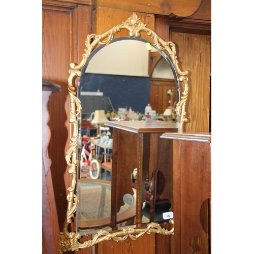 512 - Gilt framed mirror. 76 cm in height.