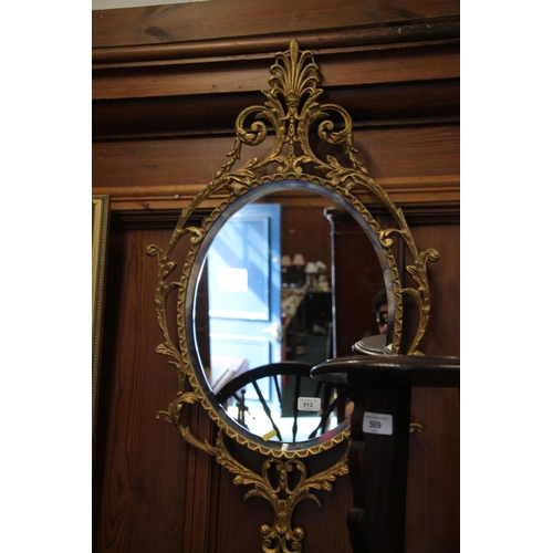 513 - Gilt framed mirror. 90cm in height.