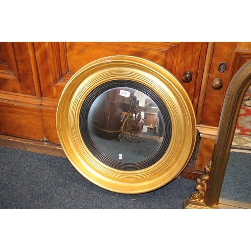 516 - Gilt framed mirror. 80cm in height,