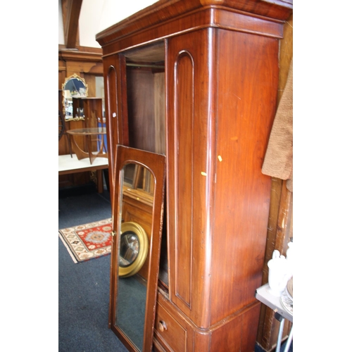 519 - Late Victorian mahogany single door wardrobe.