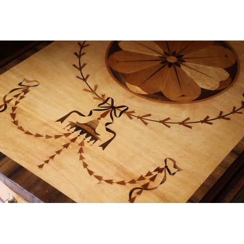 521 - Continental inlaid marquetry drop leaf table. 75cm in height.