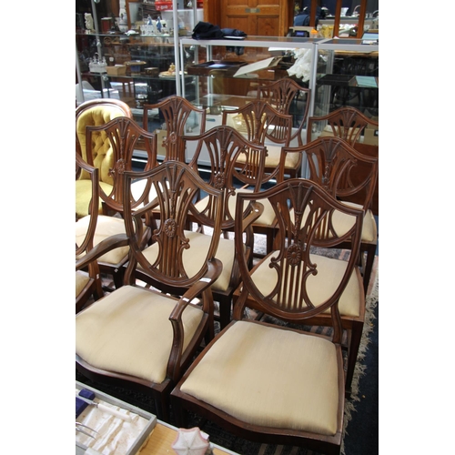 530 - Set of eight mahogany shield back dining chairs and two matching carvers