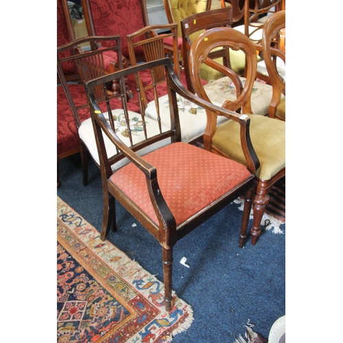 533 - An Edwardian spindle back armchair.