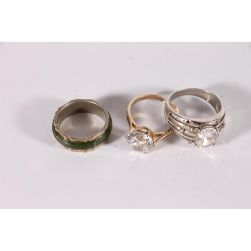 434 - 9ct gold ring set with large CZ stone, together with a silver and white stone ring and base metal gr... 