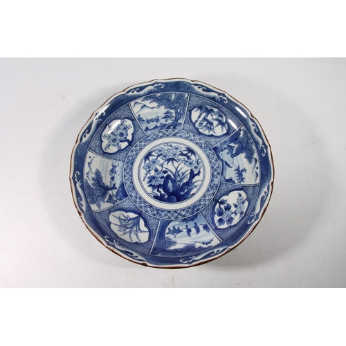 109 - Mid-20th century Japanese blue and white large bowl, 36cm wide.
