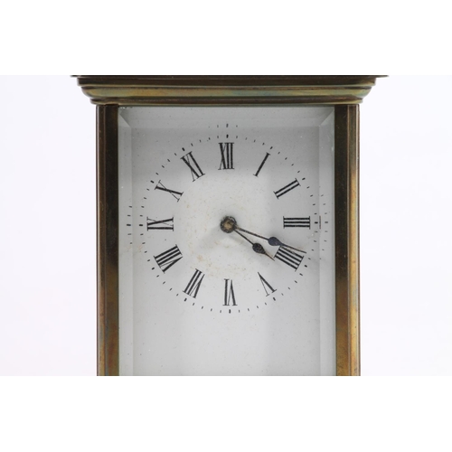11 - French brass carriage clock with  lever escapement in original corniche style case, 15cm high.