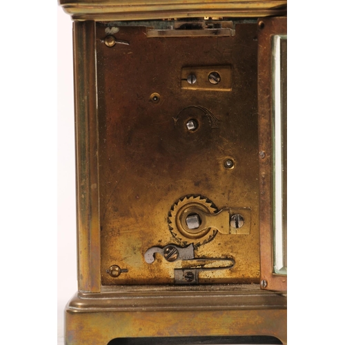 11 - French brass carriage clock with  lever escapement in original corniche style case, 15cm high.