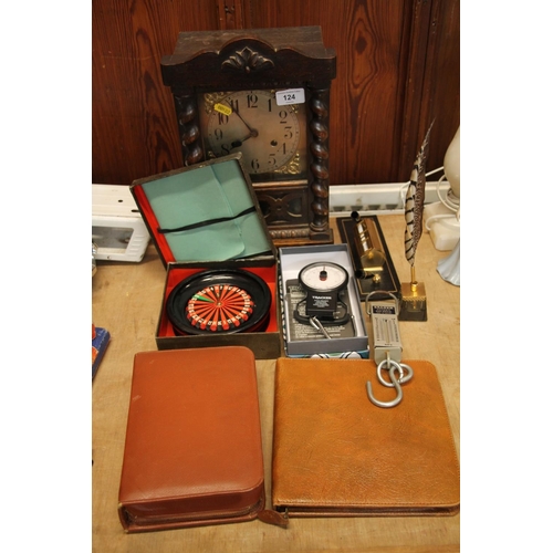 124 - Oak framed mantel clock, miniature scale balances, a perpetual calendar pen stand, etc.