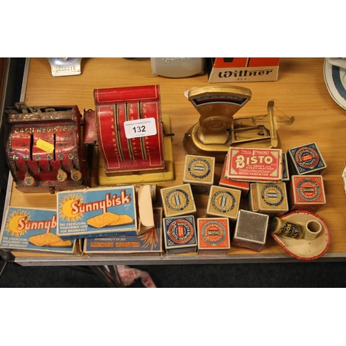 132 - Miniature vintage tinplate cash registers, vintage tinplate weighing scales, miniature Huntley and P... 