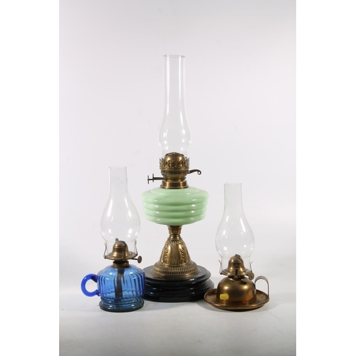 167 - Late Victorian oil lamp with green glass reservoir and two other oil lamps.