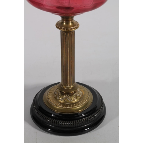 170 - Late 19th century brass oil lamp with cranberry glass reservoir.