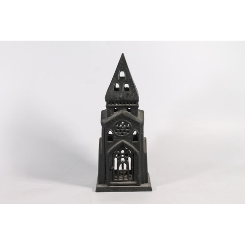 173 - Black painted cast iron candle holder, 35cm high.