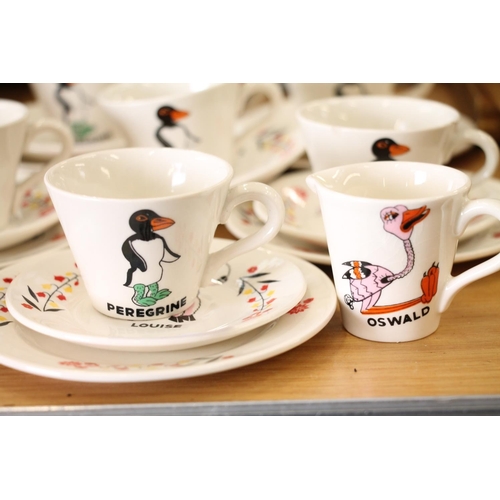 201 - Vintage child's ceramic teaset decorated with old cartoon characters.