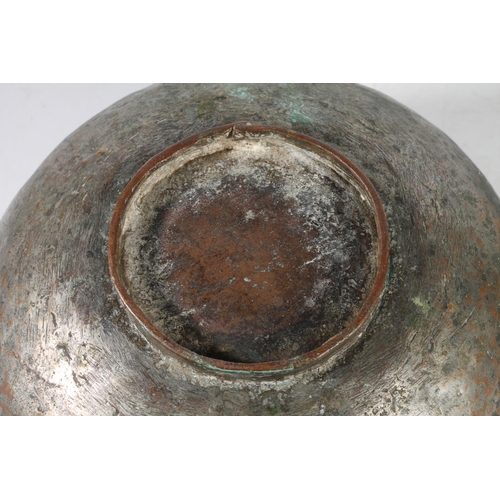25 - Islamic metal hemispherical bowl, incised designs to include dragons, rabbits and Arabic script, rai... 