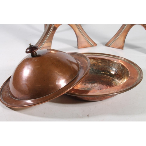 26 - Keswick School of Industrial Arts hammered copper muffin dish, stamped KSIA, 21cm diameter, and a pa... 