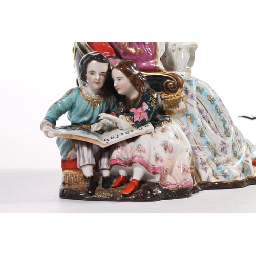 3 - 19th century porcelain figure group modelled as a lady sewing with children reading by her side, 23c... 