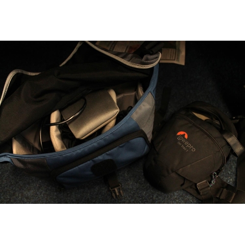 311 - Panasonic DSLR camera with lenses and accessories incl. two camera bags.