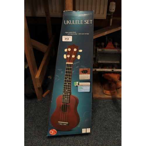 312 - Boxed Ukulele set.