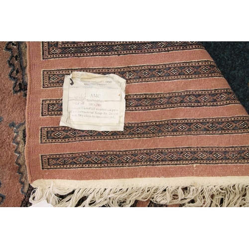 334 - Pakistan cashmere noughted carpet, 280cm x 180cm.