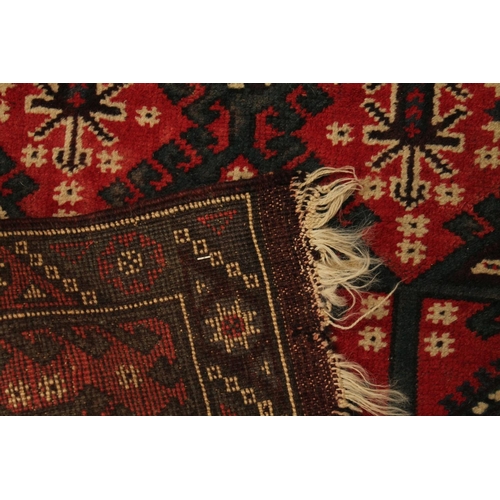 336 - Small Caucasian red background prayer rug, 122cm x 74cm.