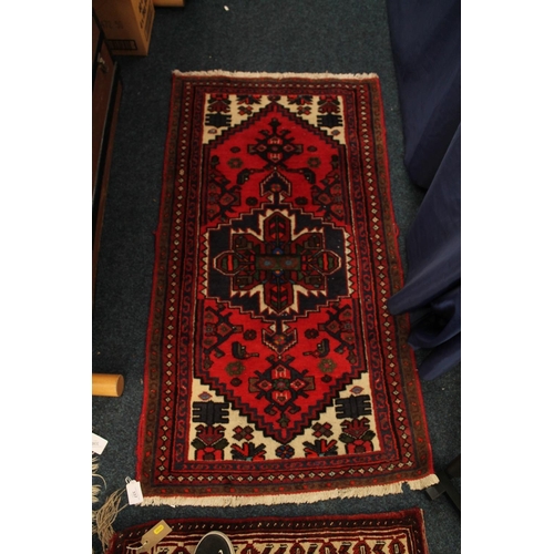 337 - Afghan red background prayer rug, 128cm x 72cm.