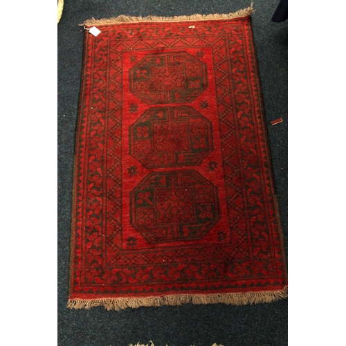 341 - Caucasian red and black prayer rug, 122cm x 78cm.