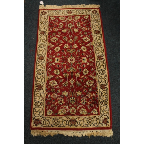 344 - Indo Sarouk rug, 131cm x 71cm.