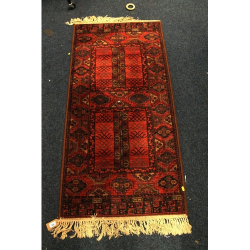 345 - Caucasian rust red runner, 135cm x 66cm.