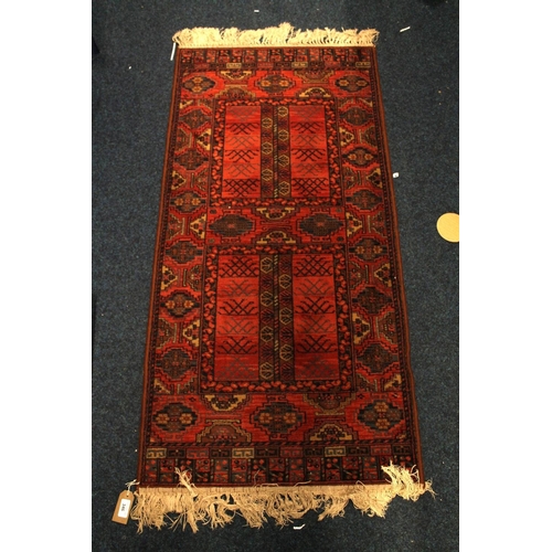 346 - Caucasian rust red runner, 135cm x 66cm.