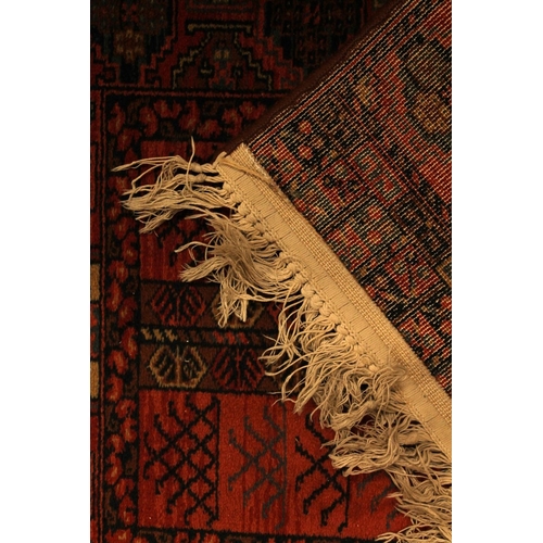 346 - Caucasian rust red runner, 135cm x 66cm.