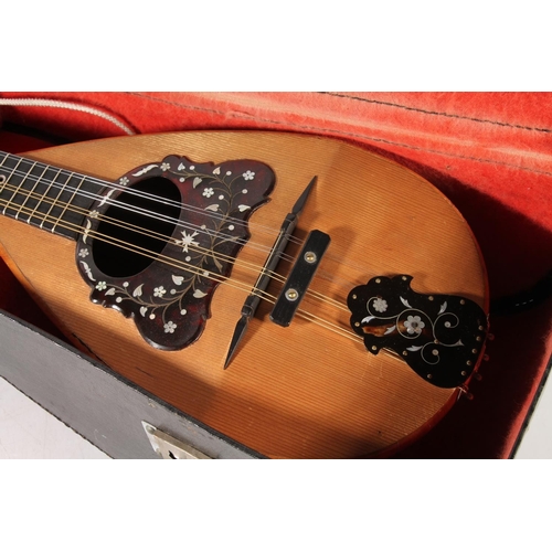 48 - Vintage mother-of-pearl inlaid mandolin, in original case.