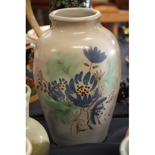 57 - Buchan ware pottery vase, and four Buchan ware glazed jugs.