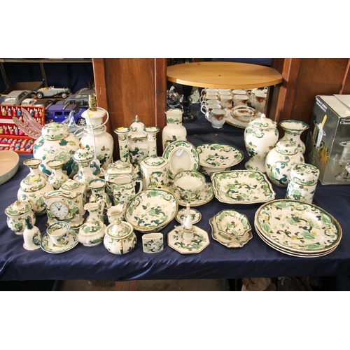 90 - Masons Ironstone Chartreuse ceramics to include a lamp base, candlesticks, vases, a clock, dinner wa... 